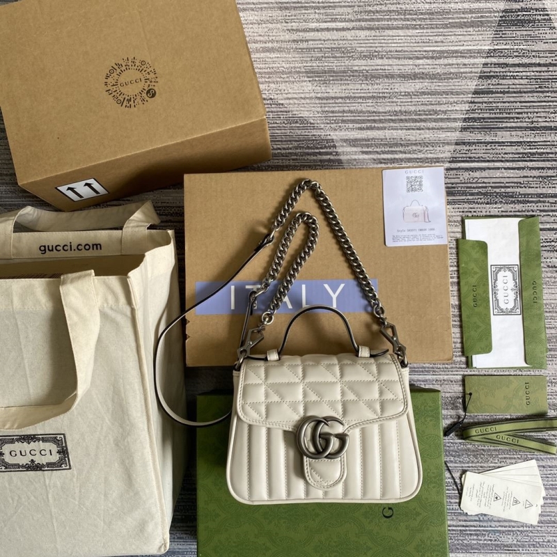 G*u*i top handle bags